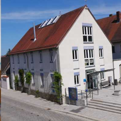 Slider der Bücherei Hallstadt als Fotowand mit Ansichten von außen und von innen